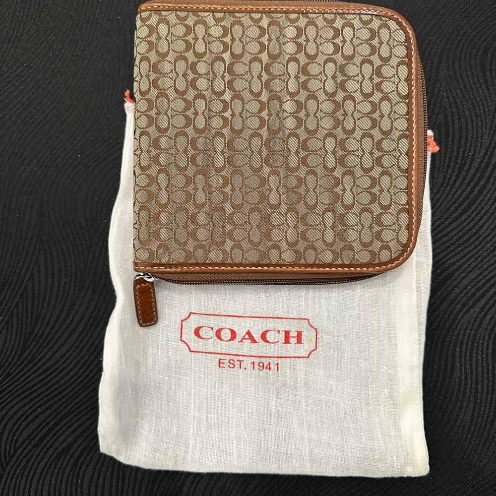 Coach CD/DVD case. Brand new with tag
